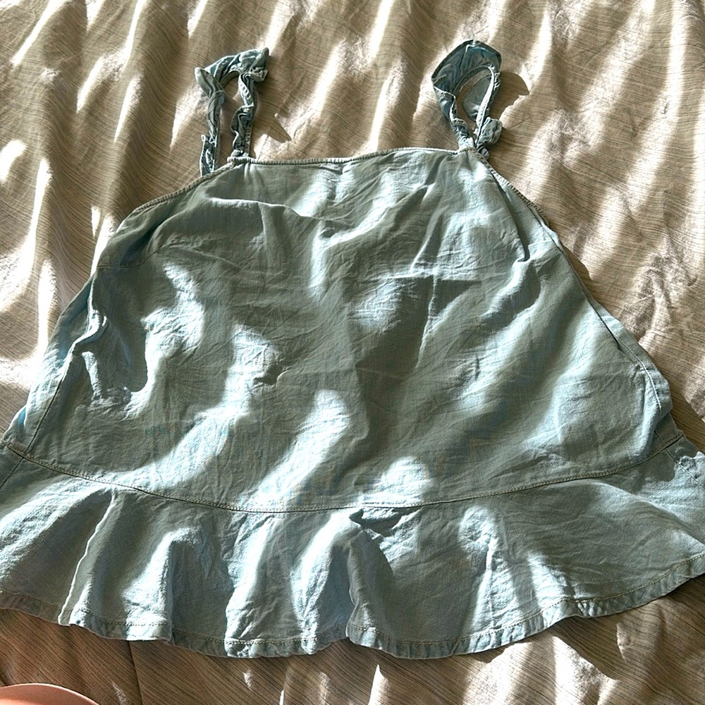 Light denim peplum tank top